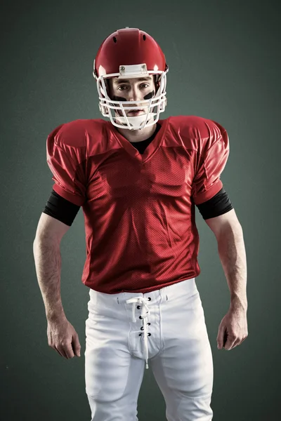Americký fotbalista nosí helmu — Stock fotografie