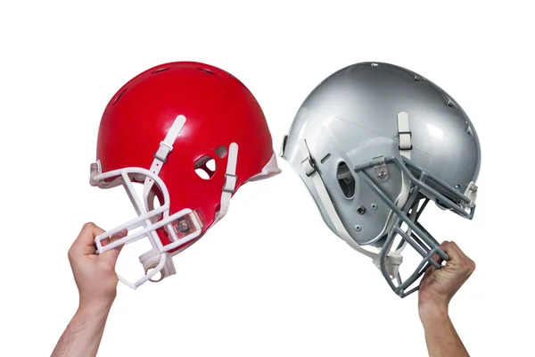 Jogador de futebol americano entregando seu capacete — Fotografia de Stock