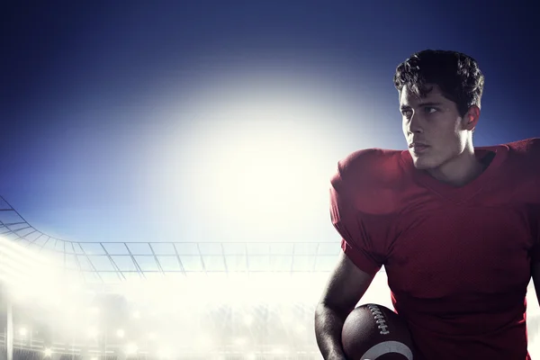 Serious american football player looking away — Stock Photo, Image