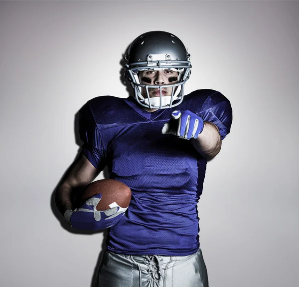 American football player in uniform pointing — Stock Photo, Image