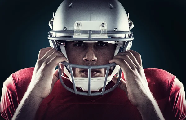 American football player holding helmet — Stock Photo, Image