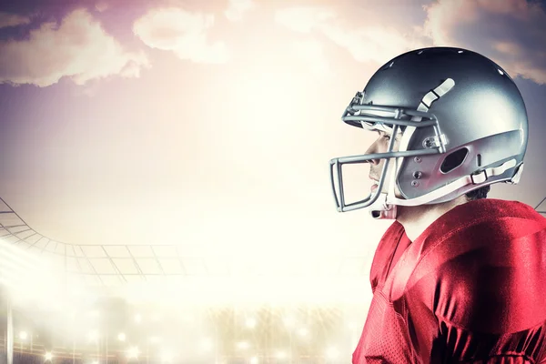 Sportsman standing against rugby stadium — Stock Photo, Image