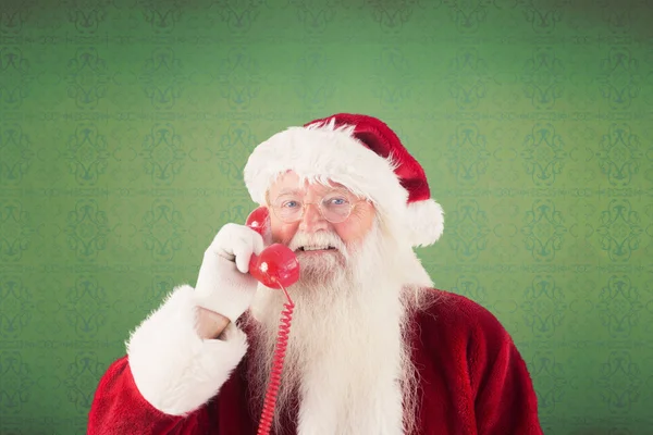 Santa claus na telefon — Zdjęcie stockowe