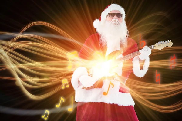 Santa Claus toca la guitarra con gafas de sol — Foto de Stock