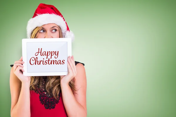 Festive blonde showing a tablet — Stock Photo, Image