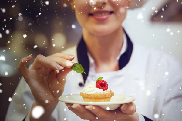 Nieve contra cocinero jefe feliz — Foto de Stock