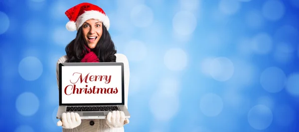 Smiling woman holding a laptop — Stock Photo, Image