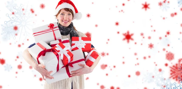 Vrouw bedrijf veel presenteert — Stockfoto