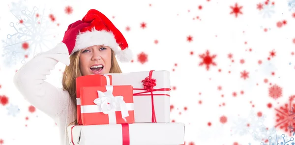 Rubia festiva sosteniendo montón de regalos —  Fotos de Stock