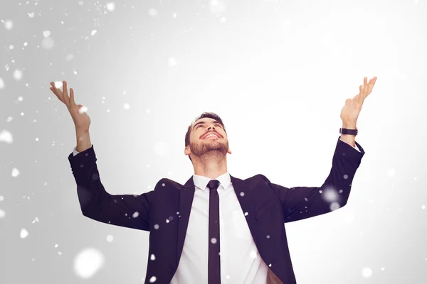 Businessman cheering with hands raised — Stock Photo, Image