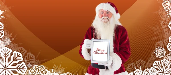 Santa παρουσιάζει ένα tablet Pc — Φωτογραφία Αρχείου
