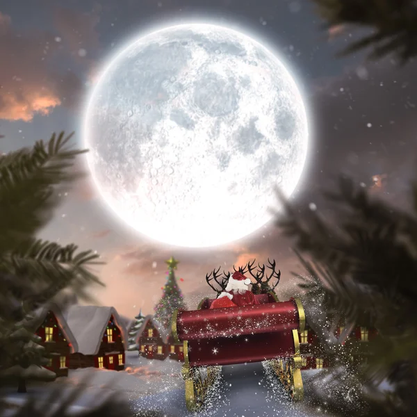 Santa flying his sleigh — Stock Photo, Image