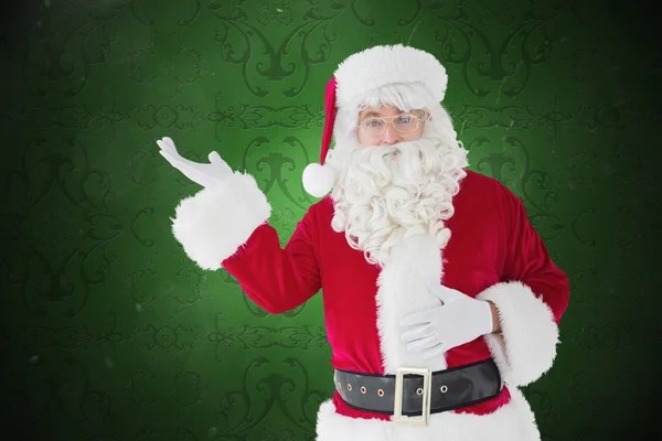 Happy santa med handen ut — Stockfoto