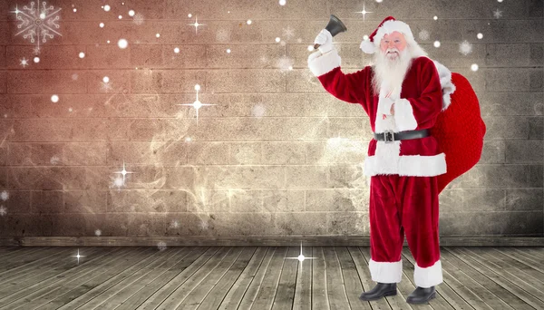 Zusammengesetztes Bild vom Weihnachtsmann, der seine Glocke läutet — Stockfoto
