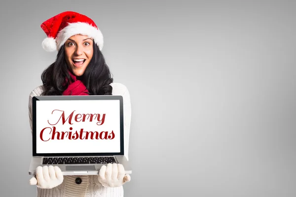 Smiling woman holding a laptop — Stock Photo, Image