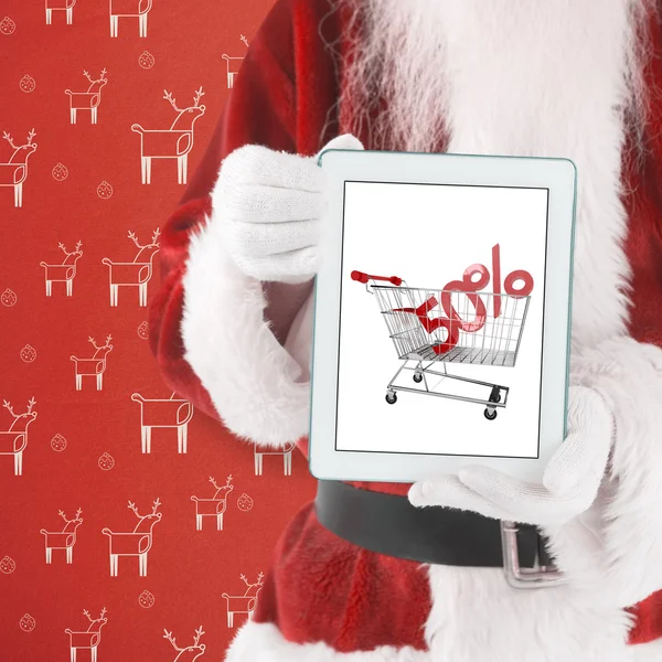 Santa presenterar en tablet Pc — Stockfoto