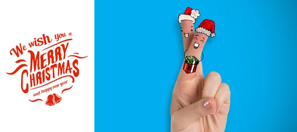 Human fingers with santa hat — Stock Photo, Image