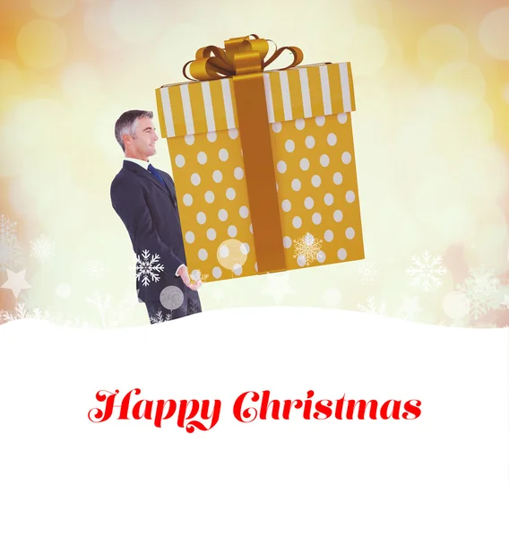 Stylish man with giant gift — Stock Photo, Image