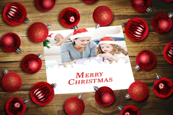 Christmas baubles on table — Stock Photo, Image