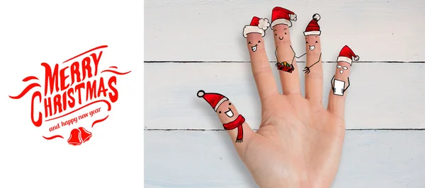Human fingers with santa hats — Stock Photo, Image