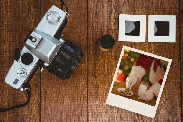 Instant photo and old camera — Stock Photo, Image