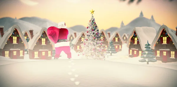 Santa trzyma worek — Zdjęcie stockowe