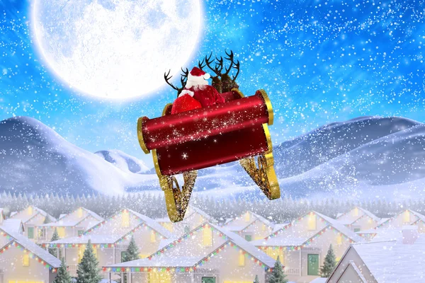 Zusammengesetztes Bild des Weihnachtsmannes, der seinen Schlitten fliegt — Stockfoto