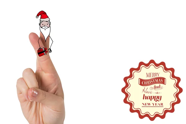 Composite image of christmas fingers — Stock Photo, Image