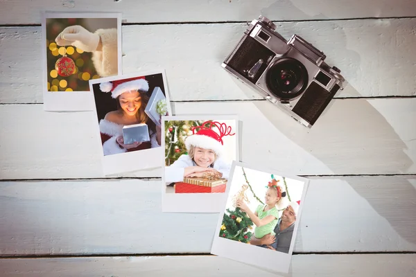 Mooie brunette in santa outfit opening cadeau — Stockfoto