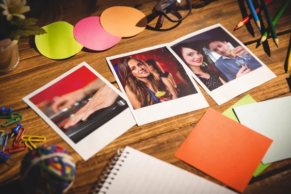 Office supplies with instant photos — Stock Photo, Image