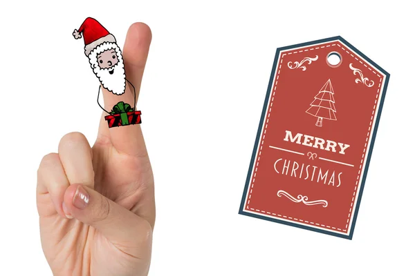 Composite image of christmas fingers — Stock Photo, Image