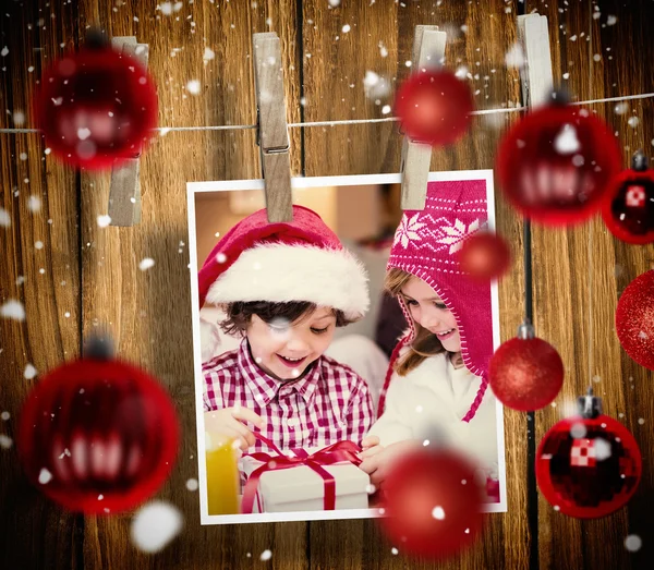 Composite image of christmas baubles — Stock Photo, Image