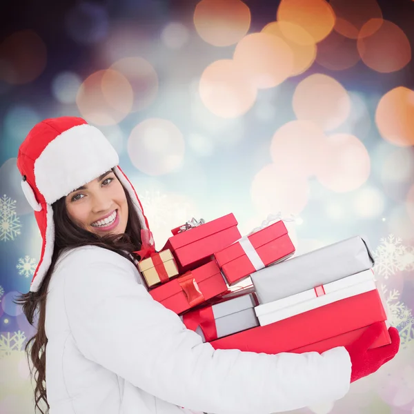 Frau mit vielen Geschenken — Stockfoto