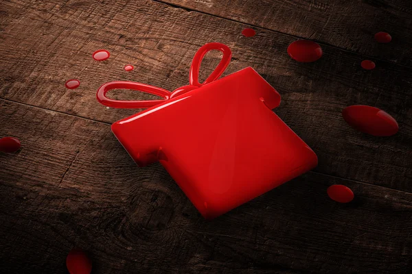 Una salpicadura de pintura de regalo rojo — Foto de Stock