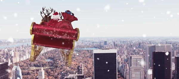 Santa flying zijn slee — Stockfoto