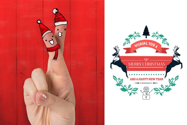 Composite image of christmas fingers — Stock Photo, Image