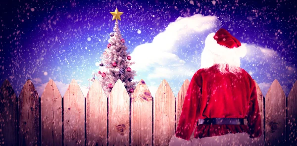 Santa uitvoering zak van giften — Stockfoto