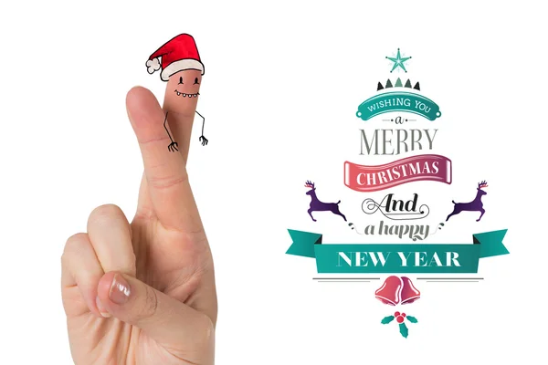 Human fingers with santa hat — Stock Photo, Image
