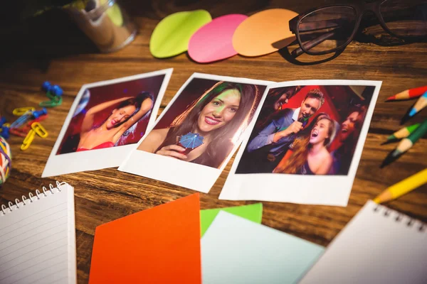Office supplies and instant photos — Stock Photo, Image