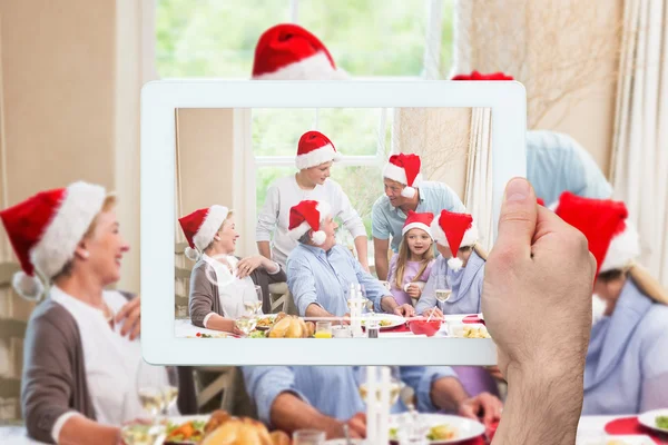 Gelukkige familie op kerstdiner — Stockfoto