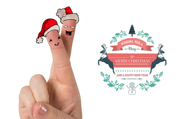 Dedos humanos con sombreros de Santa —  Fotos de Stock