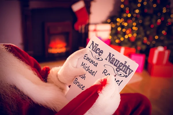 Santa claus psaní seznam brkem — Stock fotografie