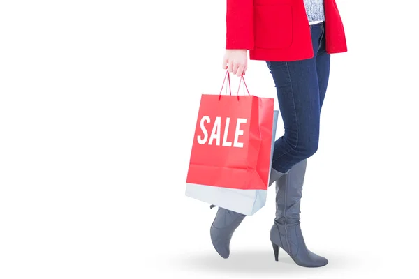 Mujer sosteniendo bolsas de compras — Foto de Stock