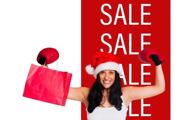 Woman wearing red boxing gloves — Stock Photo, Image