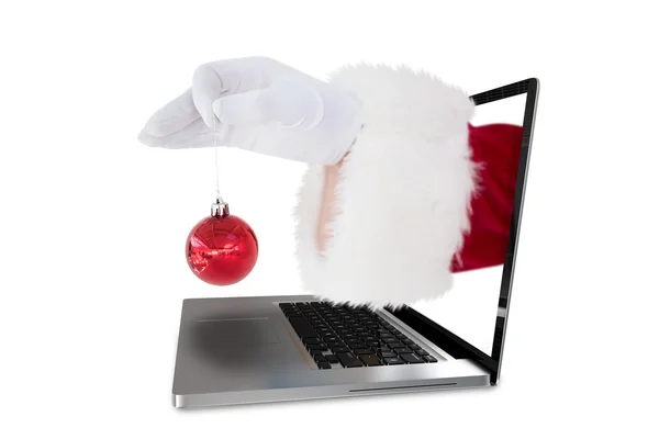 Santa Claus sosteniendo bauble rojo — Foto de Stock