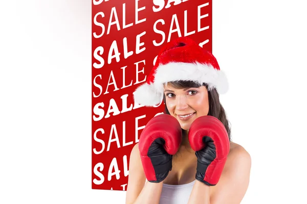 Festive brunette with boxing gloves — Stock Photo, Image