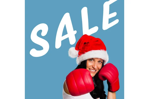 Kvinna som bär röda boxningshandskar — Stockfoto