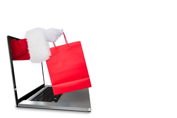 Father santa holding a shopping bag — Stock Photo, Image