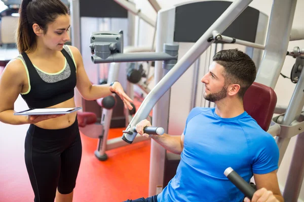 Trainer working with athlete — Stock Photo, Image