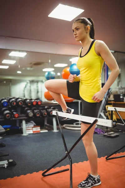 Fit woman measuring her jump — Stock Photo, Image